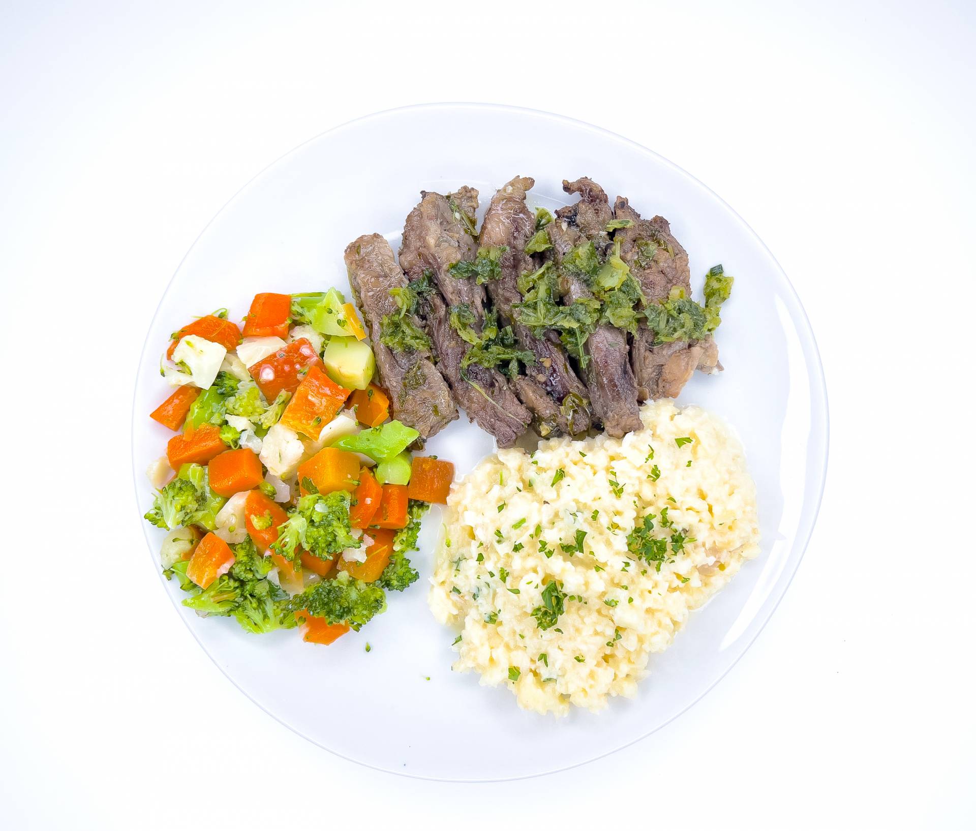 26. Churrasco con Chimichurri + Coli Risotto y Vegetales Mixtos (Especializado)